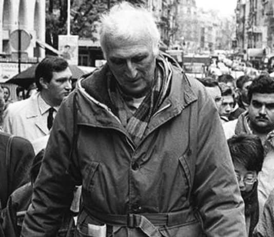 Jean Vanier leading a demonstration in support of people with disabilities.