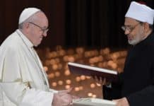 A moment of the signing of the Document on Human Fraternity by Pope Francis and the Grand Imam of Al-Azhar, Ahmed Al-Tayeb;