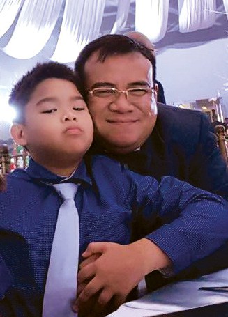 ) Fernan with his son CJ