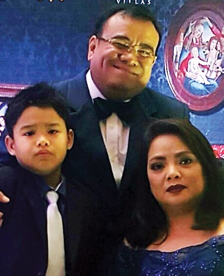 Fernan with his son CJ and his wife Christine